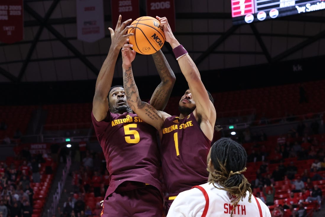 Feb 10, 2024; Salt Lake City, Utah, USA; Arizona State Sun Devils guard Jamiya Neal (5) and guard Frankie Collins (1) battle for a rebound against the Utah Utes during the second half at Jon M. Huntsman Center. Mandatory Credit: Rob Gray-USA TODAY Sports