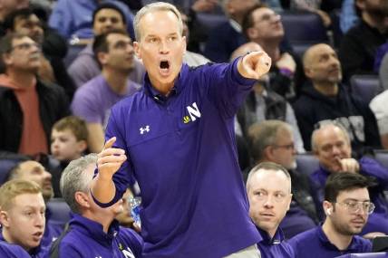 Feb 11, 2024; Evanston, Illinois, USA; Northwestern Wildcats head coach Chris Collins gestures to his team during the first half at Welsh-Ryan Arena. Mandatory Credit: David Banks-USA TODAY Sports