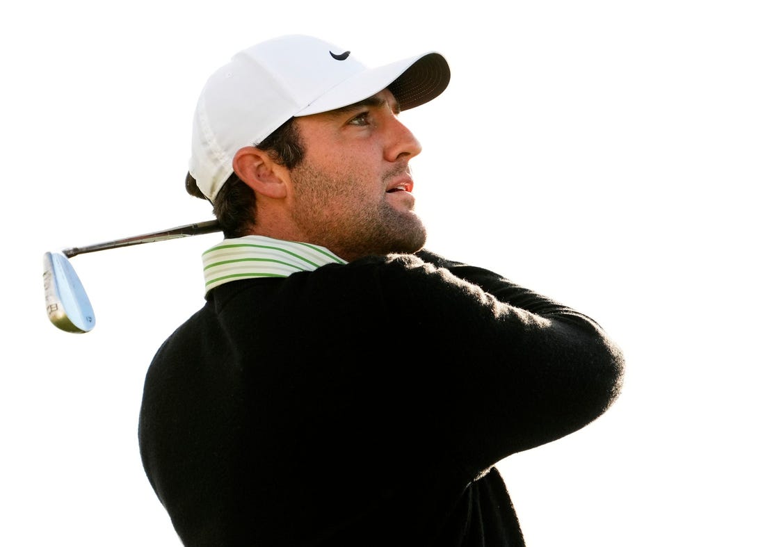 Scottie Scheffler plays his tee shot on the fourth hole during the third round of the WM Phoenix Open at TPC Scottsdale on Feb. 10, 2024.