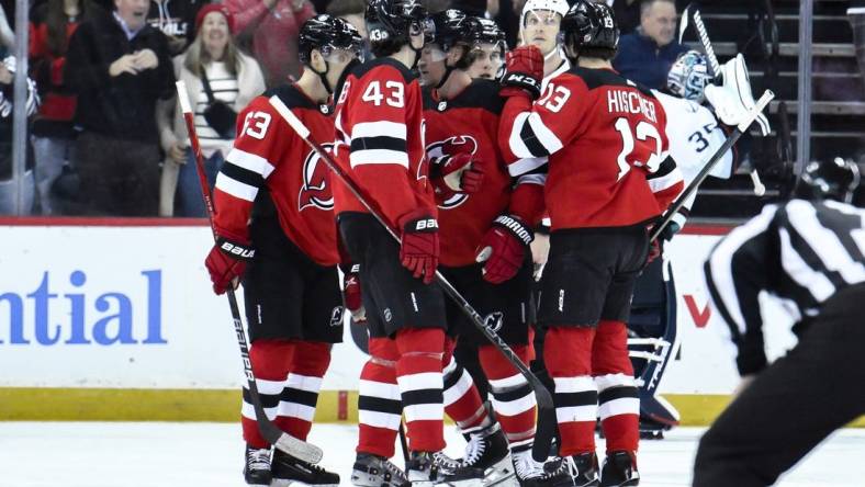 Feb 12, 2024; Newark, New Jersey, USA; New Jersey Devils right wing Tyler Toffoli (73) celebrates with teammates after scoring a goal against the Seattle Kraken during the first period at Prudential Center. Mandatory Credit: John Jones-USA TODAY Sports