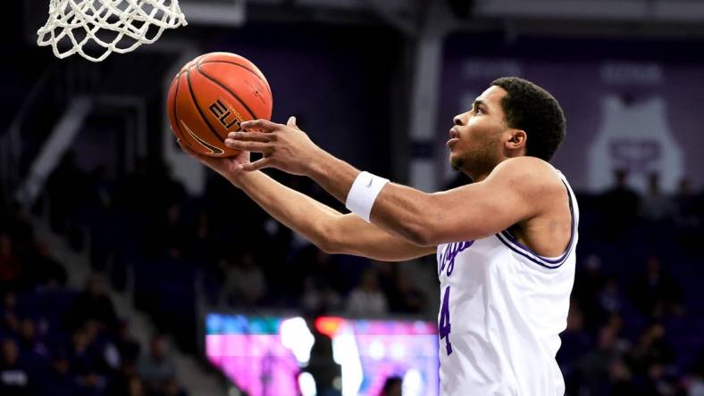 Feb 12, 2024; Fort Worth, Texas, USA;  TCU Horned Frogs guard Jameer Nelson Jr. (4) shoots during the first half against the West Virginia Mountaineers at Ed and Rae Schollmaier Arena. Mandatory Credit: Kevin Jairaj-USA TODAY Sports