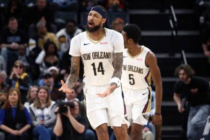 Feb 12, 2024; Memphis, Tennessee, USA; New Orleans Pelicans forward Brandon Ingram (14) reacts during the first half against the Memphis Grizzlies at FedExForum. Mandatory Credit: Petre Thomas-USA TODAY Sports