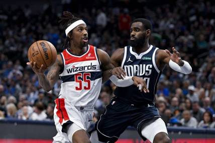 Feb 12, 2024; Dallas, Texas, USA; Washington Wizards guard Delon Wright (55) drives to the basket past Dallas Mavericks forward Tim Hardaway Jr. (10) during the second quarter at the American Airlines Center. Mandatory Credit: Jerome Miron-USA TODAY Sports