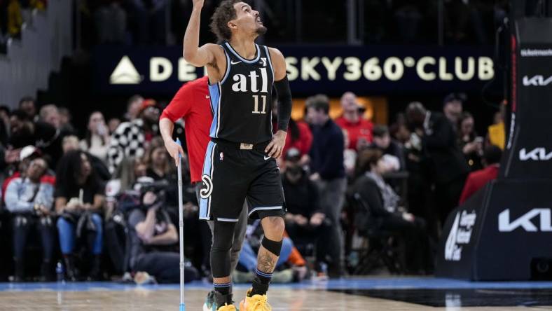 Feb 12, 2024; Atlanta, Georgia, USA; Atlanta Hawks guard Trae Young (11) gestures after being called for a technical foul against the Chicago Bulls during the second half at State Farm Arena. Mandatory Credit: Dale Zanine-USA TODAY Sports