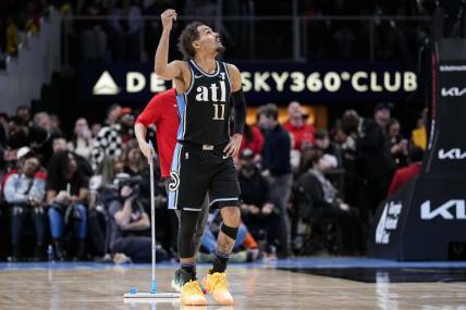 Feb 12, 2024; Atlanta, Georgia, USA; Atlanta Hawks guard Trae Young (11) gestures after being called for a technical foul against the Chicago Bulls during the second half at State Farm Arena. Mandatory Credit: Dale Zanine-USA TODAY Sports