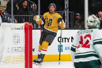 Feb 12, 2024; Las Vegas, Nevada, USA; Vegas Golden Knights right wing Mark Stone (61) celebrates after scoring a goal against the Minnesota Wild during the third period at T-Mobile Arena. Mandatory Credit: Stephen R. Sylvanie-USA TODAY Sports