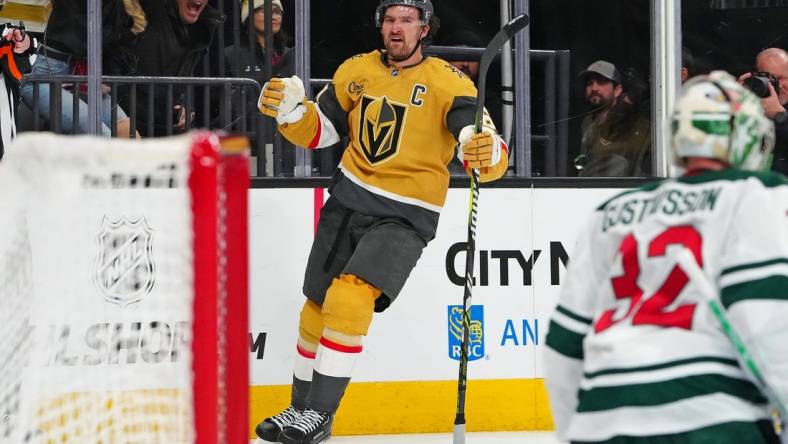 Feb 12, 2024; Las Vegas, Nevada, USA; Vegas Golden Knights right wing Mark Stone (61) celebrates after scoring a goal against the Minnesota Wild during the third period at T-Mobile Arena. Mandatory Credit: Stephen R. Sylvanie-USA TODAY Sports