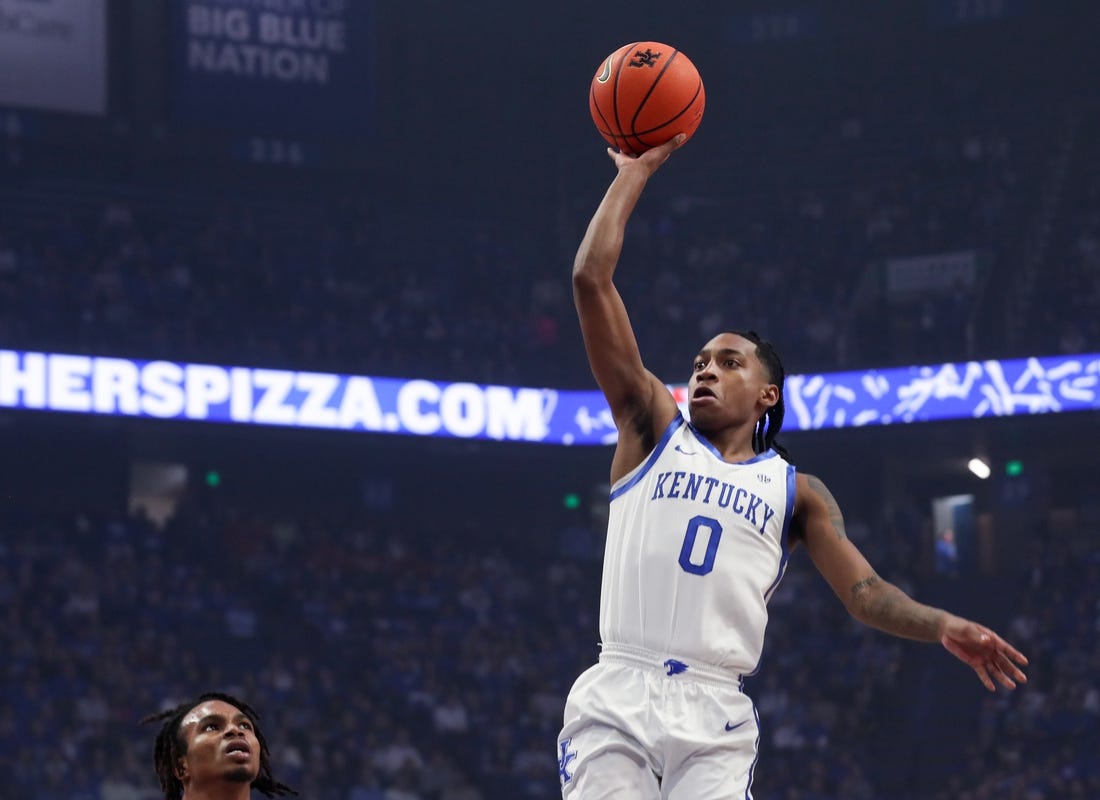 Kentucky   s Rob Dillingham makes the bucket against Ole Miss Tuesday night in Rupp Arena.
Feb. 13, 2024