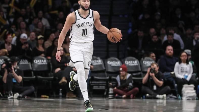 Feb 13, 2024; Brooklyn, New York, USA;  Brooklyn Nets guard Ben Simmons (10) brings the ball up court in the third quarter against the Boston Celtics at Barclays Center. Mandatory Credit: Wendell Cruz-USA TODAY Sports