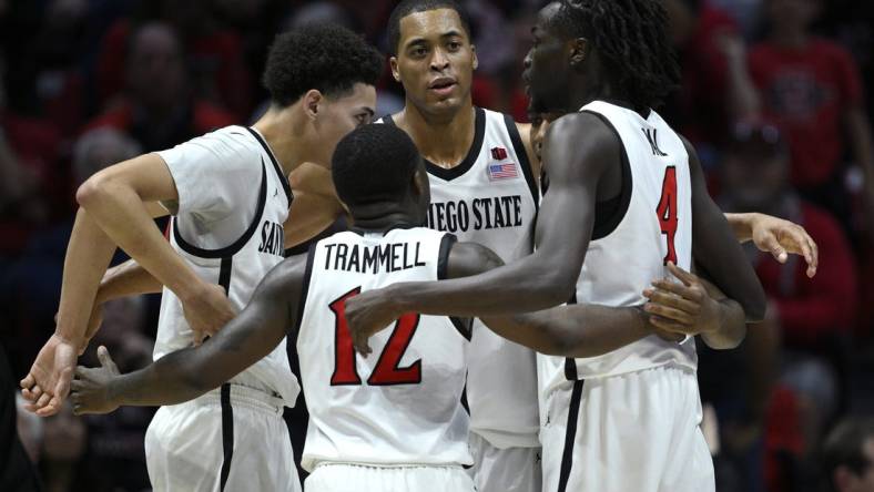 Feb 13, 2024; San Diego, California, USA; San Diego State Aztecs forward Jaedon LeDee (13) huddles with teammates during the second half against the Colorado State Rams at Viejas Arena. Mandatory Credit: Orlando Ramirez-USA TODAY Sports