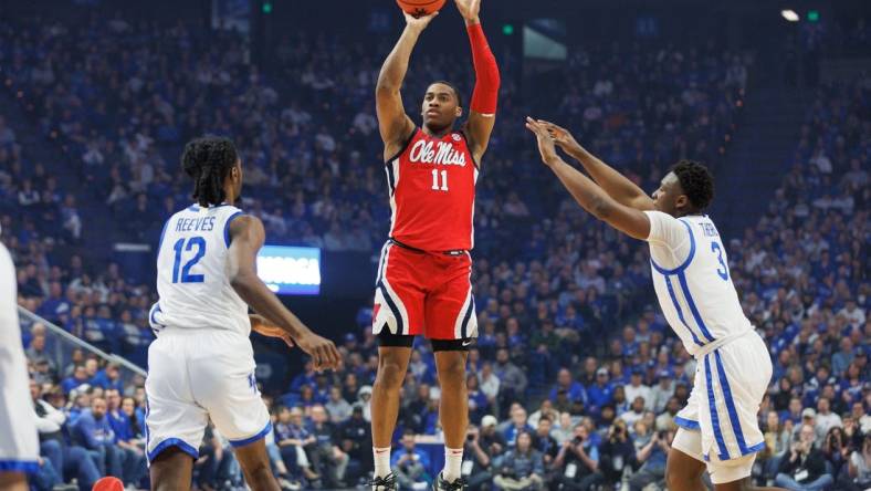 Feb 13, 2024; Lexington, Kentucky, USA; Ole Miss Rebels guard Matthew Murrell (11) makes a three point basket during the first half against the Kentucky Wildcats at Rupp Arena at Central Bank Center. Mandatory Credit: Jordan Prather-USA TODAY Sports