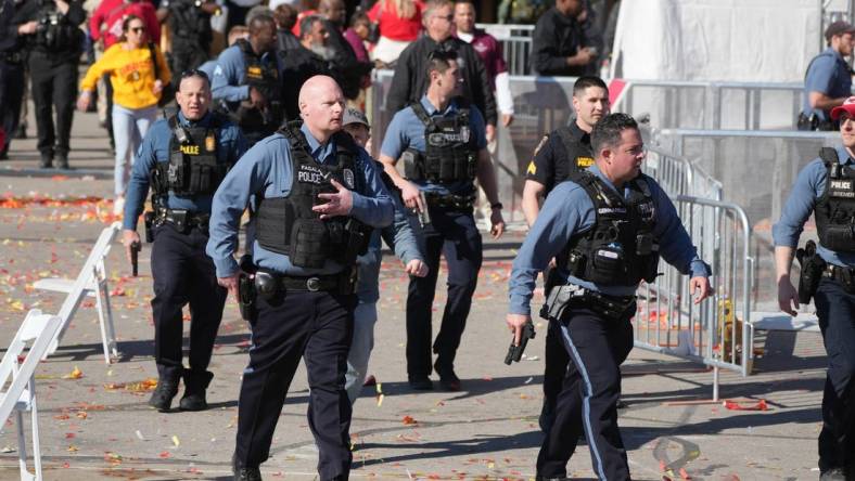 Feb 14, 2024; Kansas City, MO, USA; Police respond after gun shots were fired after the celebration of the Kansas City Chiefs winning Super Bowl LVIII. Mandatory Credit: Kirby Lee-USA TODAY Sports