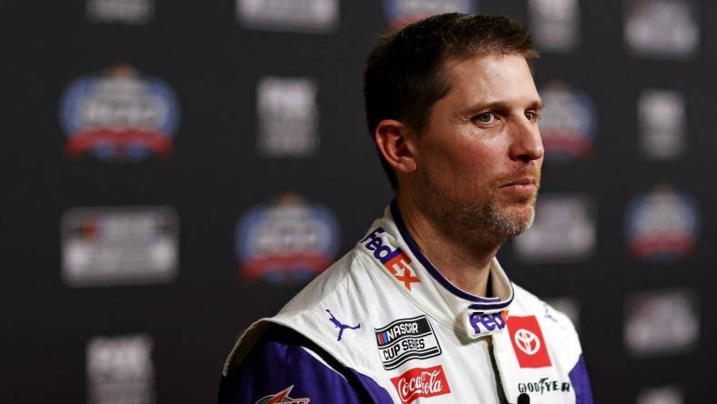 Feb 14, 2024; Daytona Beach, Florida, USA; NASCAR Cup Series driver Denny Hamlin (11) during Daytona 500 Media Day at Daytona International Speedway. Mandatory Credit: Peter Casey-USA TODAY Sports