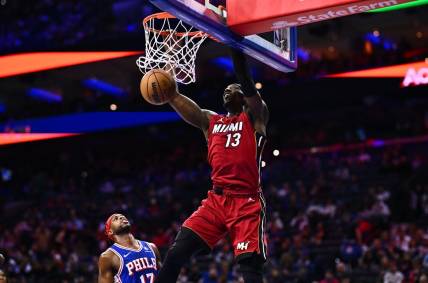 Feb 14, 2024; Philadelphia, Pennsylvania, USA; Miami Heat center Bam Adebayo (13) dunks against the Philadelphia 76ers in the first quarter at Wells Fargo Center. Mandatory Credit: Kyle Ross-USA TODAY Sports