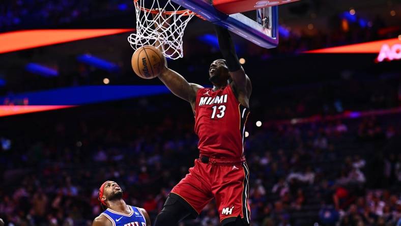 Feb 14, 2024; Philadelphia, Pennsylvania, USA; Miami Heat center Bam Adebayo (13) dunks against the Philadelphia 76ers in the first quarter at Wells Fargo Center. Mandatory Credit: Kyle Ross-USA TODAY Sports