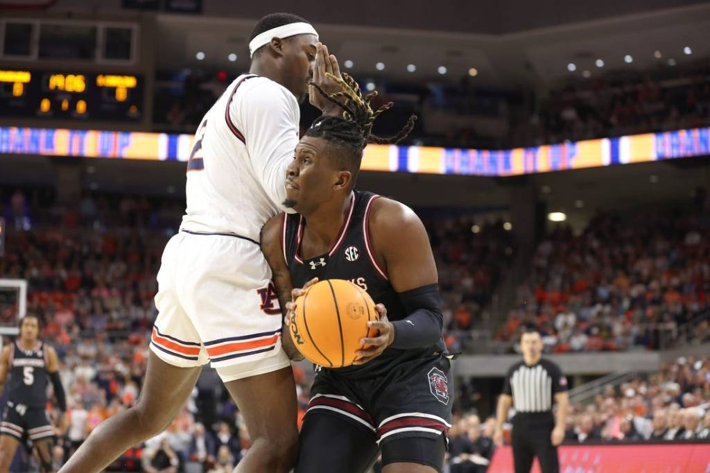 Feb 14, 2024; Auburn, Alabama, USA; South Carolina Gamecocks forward B.J. Mack (2) is fouled by Auburn Tigers forward Jaylin Williams (2) during the first half at Neville Arena. Mandatory Credit: John Reed-USA TODAY Sports