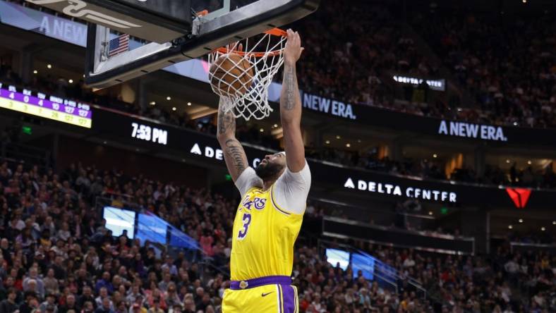 Feb 14, 2024; Salt Lake City, Utah, USA;  Utah Jazz guard Keyonte George (3) dunks the ball during the second quarter against the Utah Jazz at Delta Center. Mandatory Credit: Chris Nicoll-USA TODAY Sports