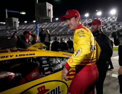 Joey Logano is all smiles after winning the pole for the Daytona 500 during pole qualifying at Daytona International Speedway, Wednesday, Feb. 14, 2024.