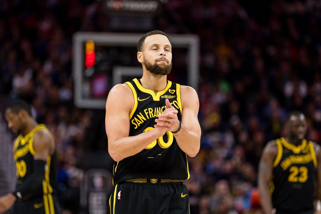 Feb 14, 2024; San Francisco, California, USA; Golden State Warriors guard Stephen Curry (30) reacts after missing a shot against the LA Clippers during the second half at Chase Center. Mandatory Credit: John Hefti-USA TODAY Sports