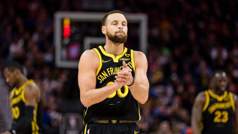 Feb 14, 2024; San Francisco, California, USA; Golden State Warriors guard Stephen Curry (30) reacts after missing a shot against the LA Clippers during the second half at Chase Center. Mandatory Credit: John Hefti-USA TODAY Sports