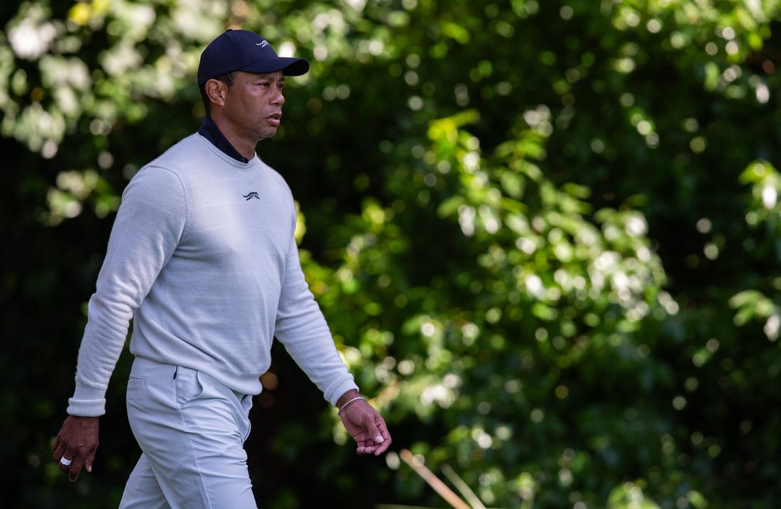 Feb 15, 2024; Pacific Palisades, California, USA; Tiger Woods on the 12th hole during the first round of The Genesis Invitational golf tournament. Mandatory Credit: Jason Parkhurst-USA TODAY Sports