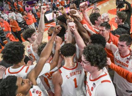 Feb 14, 2024; Clemson, South Carolina, USA; Clemson celebrates after the game with Miami at Littlejohn Coliseum Wednesday, February 14, 2024.  Chase Hunter led the Tigers with 20 points in their 77-60 win.  Mandatory Credit: Ken Ruinard-USA TODAY Sports