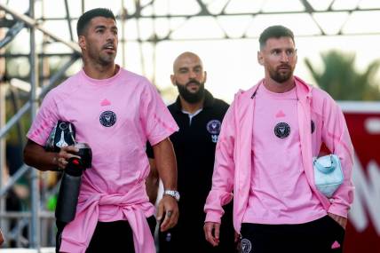 Feb 15, 2024; Fort Lauderdale, FL, USA;  Inter Miami CF forward Lionel Messi (10) and Inter Miami CF forward Luis Suarez (9) arrive for a game against the Newell's Old Boys at DRV PNK Stadium. Mandatory Credit: Nathan Ray Seebeck-USA TODAY Sports
