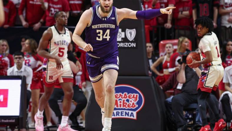 Feb 15, 2024; Piscataway, New Jersey, USA; Northwestern Wildcats center Matthew Nicholson (34) reacts after making a basket against the Rutgers Scarlet Knights during the second half at Jersey Mike's Arena. Mandatory Credit: Vincent Carchietta-USA TODAY Sports