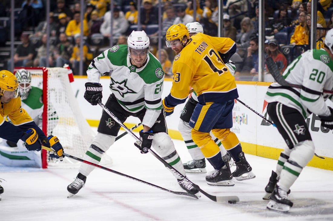 Feb 15, 2024; Nashville, Tennessee, USA; Dallas Stars left wing Mason Marchment (27) skates with the puck  against the Nashville Predators during the first period at Bridgestone Arena. Mandatory Credit: Steve Roberts-USA TODAY Sports