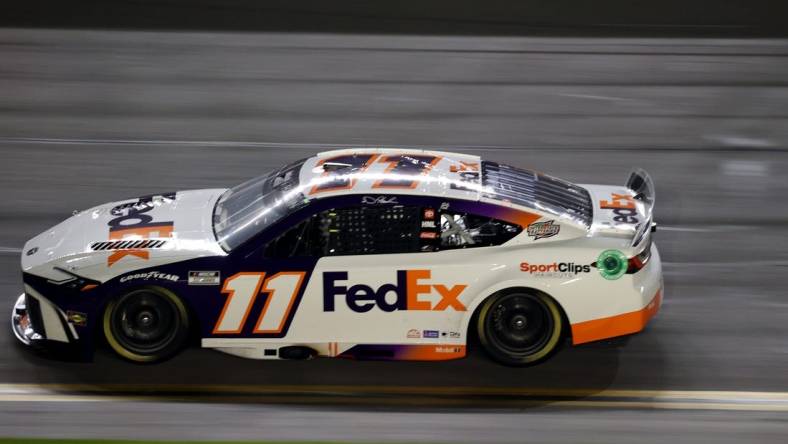 Feb 15, 2024; Daytona Beach, Florida, USA; NASCAR Cup Series driver Denny Hamlin (11) during the Bluegreen Vacations Duel 2 at Daytona International Speedway. Mandatory Credit: Peter Casey-USA TODAY Sports