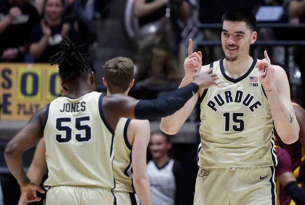 Purdue Boilermakers guard Lance Jones (55) and Purdue Boilermakers center Zach Edey (15) celebrate during the NCAA men   s basketball game against the Minnesota Golden Gophers, Thursday, Feb. 15, 2024, at Mackey Arena in West Lafayette, Ind.