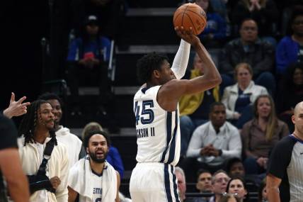 Feb 15, 2024; Memphis, Tennessee, USA; Memphis Grizzlies forward GG Jackson (45) shoots for three during the second half against the Milwaukee Bucks at FedExForum. Mandatory Credit: Petre Thomas-USA TODAY Sports