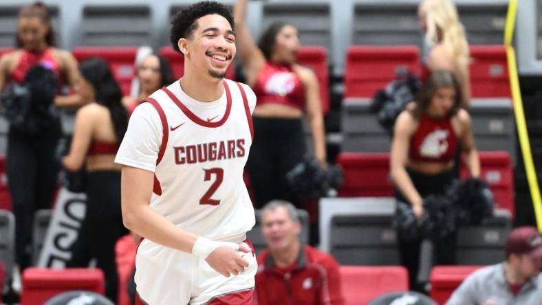 Feb 15, 2024; Pullman, Washington, USA; Washington State Cougars guard Myles Rice (2) cracks a smile after a score against the California Golden Bears in the second half at Friel Court at Beasley Coliseum. Washington State Cougars won 84-65. Mandatory Credit: James Snook-USA TODAY Sports