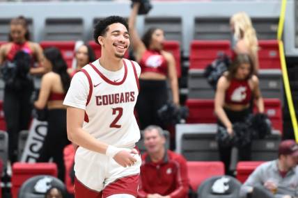 Feb 15, 2024; Pullman, Washington, USA; Washington State Cougars guard Myles Rice (2) cracks a smile after a score against the California Golden Bears in the second half at Friel Court at Beasley Coliseum. Washington State Cougars won 84-65. Mandatory Credit: James Snook-USA TODAY Sports