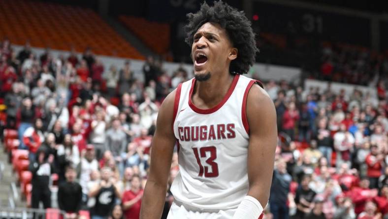 Feb 15, 2024; Pullman, Washington, USA; Washington State Cougars forward Isaac Jones (13) celebrates a basket and foul during a game against the California Golden Bears in the second half at Friel Court at Beasley Coliseum. Washington State Cougars won 84-65. Mandatory Credit: James Snook-USA TODAY Sports