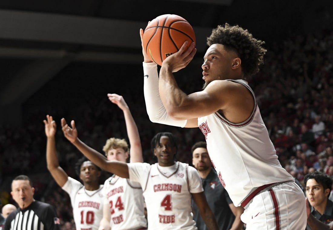 Feb 17, 2024; Tuscaloosa, Alabama, USA;  Alabama Crimson Tide guard Mark Sears (1) shoots a three point shot against the Texas A&M Aggies during the second half at Coleman Coliseum. Alabama won 100-75. Mandatory Credit: Gary Cosby Jr.-USA TODAY Sports