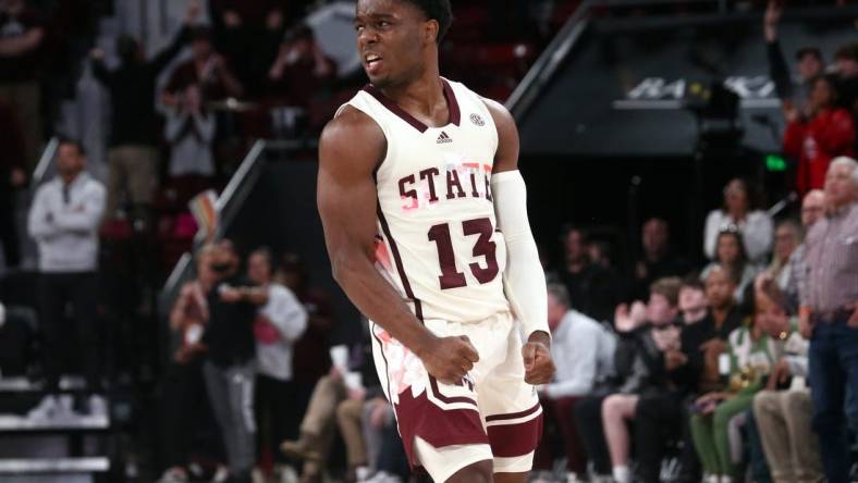 Feb 17, 2024; Starkville, Mississippi, USA; Mississippi State Bulldogs guard Josh Hubbard (13) reacts after a three point basket against the Arkansas Razorbacks during the second half at Humphrey Coliseum. Mandatory Credit: Petre Thomas-USA TODAY Sports