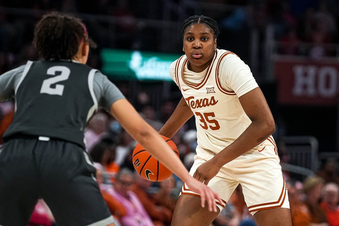 Texas Longhorns guard Madison Booker (35) looks for an open team mate for a pass during the basketball game against Iowa State at the Moody Center on Saturday, Feb. 17, 2024 in Austin.