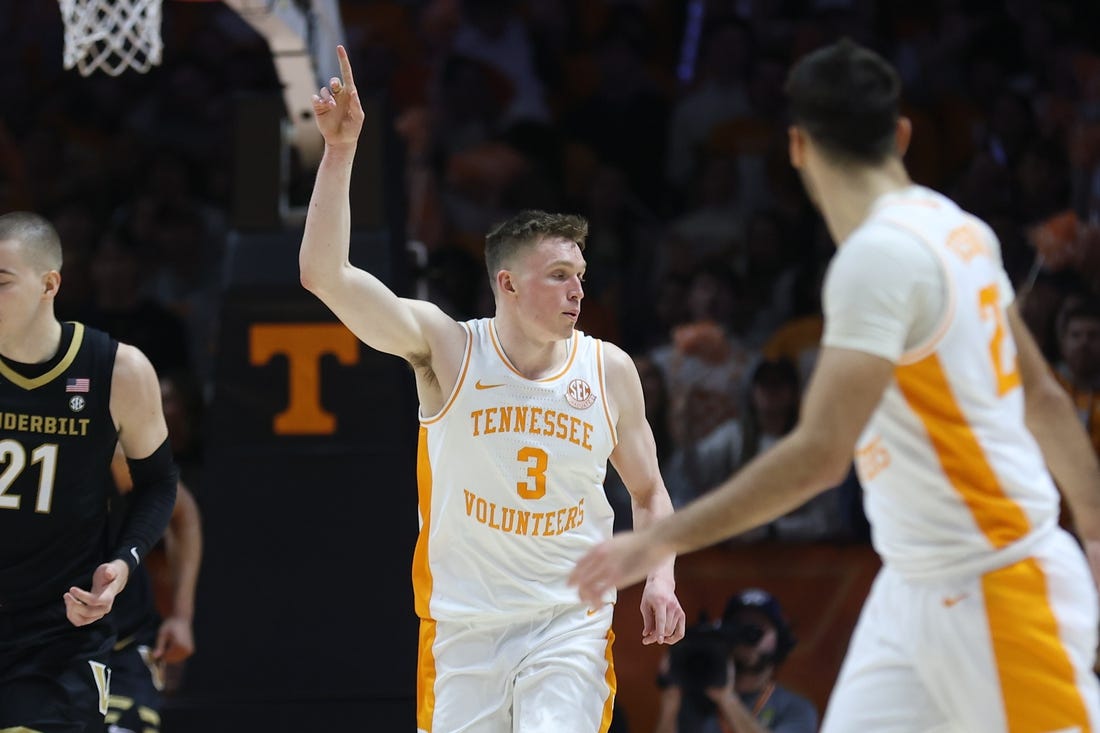 Feb 17, 2024; Knoxville, Tennessee, USA; Tennessee Volunteers guard Dalton Knecht (3) reacts after scoring a three pointer against the Vanderbilt Commodores during the first half at Thompson-Boling Arena at Food City Center. Mandatory Credit: Randy Sartin-USA TODAY Sports