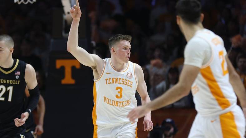 Feb 17, 2024; Knoxville, Tennessee, USA; Tennessee Volunteers guard Dalton Knecht (3) reacts after scoring a three pointer against the Vanderbilt Commodores during the first half at Thompson-Boling Arena at Food City Center. Mandatory Credit: Randy Sartin-USA TODAY Sports