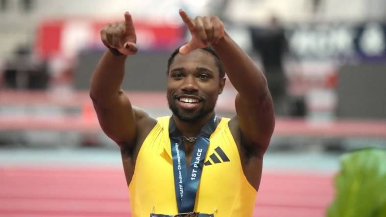 Feb 17, 2024; Albuquerque, NM, USA; Noah Lyles gestures after winning the 60m in 6.43 during the USATF Indoor Championships at Albuquerque Convention Center. Mandatory Credit: Kirby Lee-USA TODAY Sports