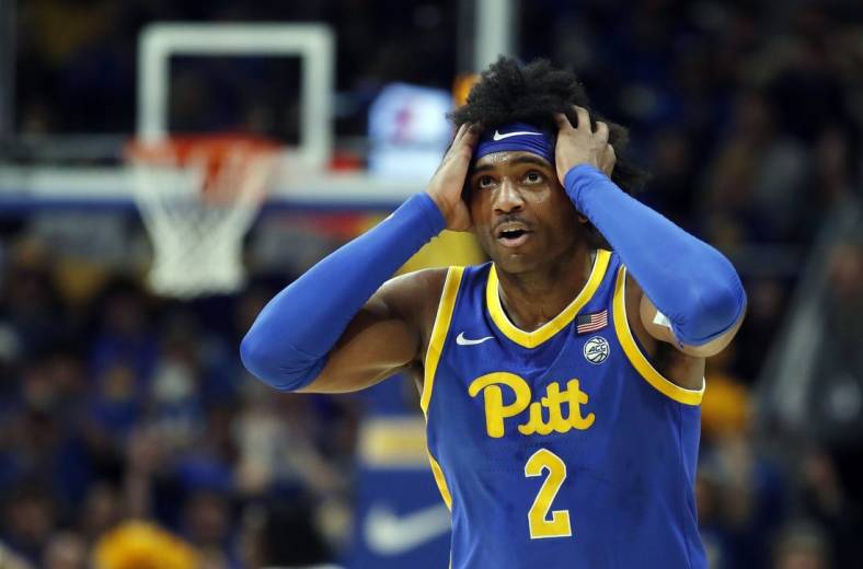 Feb 17, 2024; Pittsburgh, Pennsylvania, USA;  Pittsburgh Panthers forward Blake Hinson (2) reacts after making a three point basket against the Louisville Cardinals during the first half at the Petersen Events Center. Pittsburgh won 86-59. Mandatory Credit: Charles LeClaire-USA TODAY Sports
