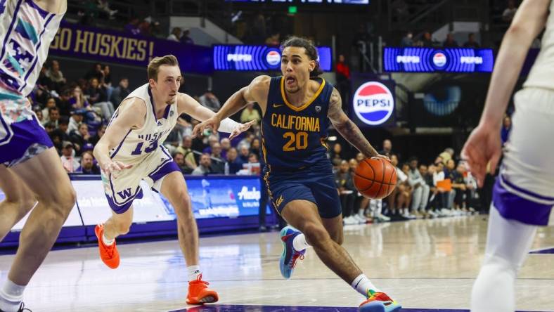 Feb 17, 2024; Seattle, Washington, USA; California Golden Bears guard Jaylon Tyson (20) dribbles past Washington Huskies forward Moses Wood (13) during the first half at Alaska Airlines Arena at Hec Edmundson Pavilion. Mandatory Credit: Joe Nicholson-USA TODAY Sports