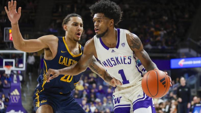 Feb 17, 2024; Seattle, Washington, USA; Washington Huskies forward Keion Brooks Jr. (1) dribbles against California Golden Bears guard Jaylon Tyson (20) during the first half at Alaska Airlines Arena at Hec Edmundson Pavilion. Mandatory Credit: Joe Nicholson-USA TODAY Sports