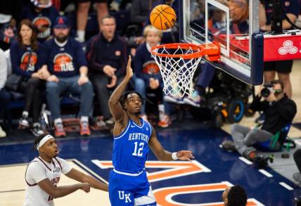 Kentucky Wildcats guard Antonio Reeves (12) goes up for a layup as Auburn Tigers take on Kentucky Wildcats at Neville Arena in Auburn, Ala., on Saturday, Feb. 17, 2024. Kentucky Wildcats defeated Auburn Tigers 70-59.