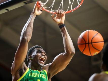 Oregon Ducks center N'Faly Dante (1) dunks the ball to give the Ducks a win against the Oregon State Beavers on Saturday, Feb. 17, 2024 at Gill Coliseum in Corvallis, Ore. The final score of the game was 60-58.