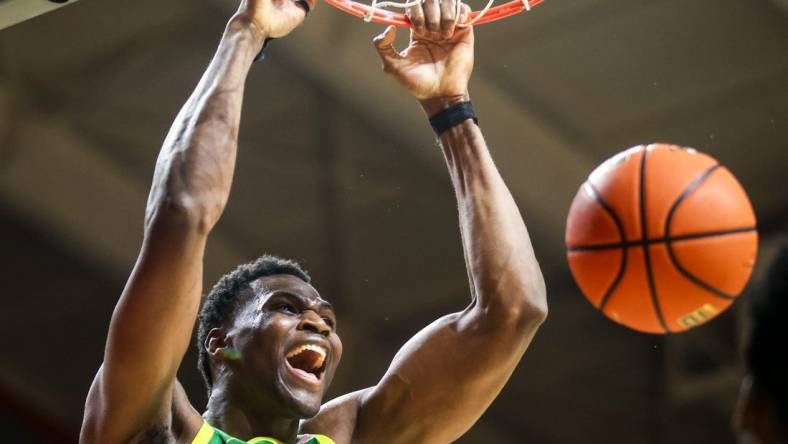 Oregon Ducks center N'Faly Dante (1) dunks the ball to give the Ducks a win against the Oregon State Beavers on Saturday, Feb. 17, 2024 at Gill Coliseum in Corvallis, Ore. The final score of the game was 60-58.