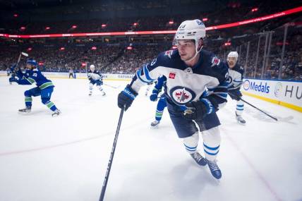 Feb 17, 2024; Vancouver, British Columbia, CAN; Winnipeg Jets forward Sean Monahan (23) skates against the Vancouver Canucks in the second period at Rogers Arena. Mandatory Credit: Bob Frid-USA TODAY Sports