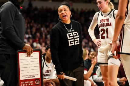 Feb 18, 2024; Columbia, South Carolina, USA; South Carolina Gamecocks head coach Dawn Staley directs her team against the Georgia Lady Bulldogs in the second half at Colonial Life Arena. Mandatory Credit: Jeff Blake-USA TODAY Sports