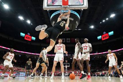 Feb 18, 2024; Columbus, Ohio, USA; Purdue Boilermakers center Zach Edey (15) dunks during the first half of the NCAA men   s basketball game against the Ohio State Buckeyes at Value City Arena. Ohio State won 73-69.